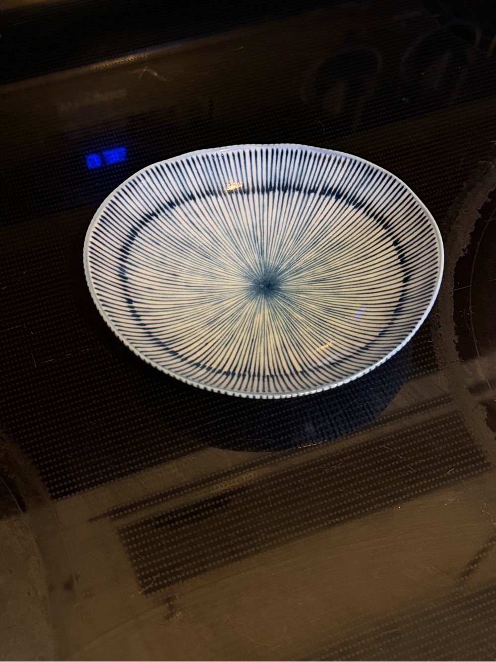 Blue and white Japanese ceramic dish. Small like trinket dish.